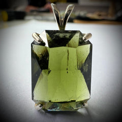 Faceted Moldavite pendant - Emerald cut 8.34 carat.