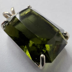 Faceted Moldavite pendant - Emerald cut 8.34 carat.