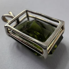 Faceted Moldavite pendant - Emerald cut 8.34 carat.
