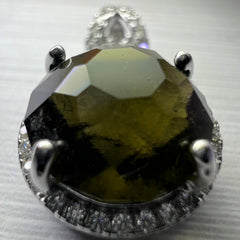 Faceted Moldavite pendant with Zircon 3.28ct