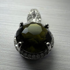 Faceted Moldavite pendant with Zircon 3.28ct