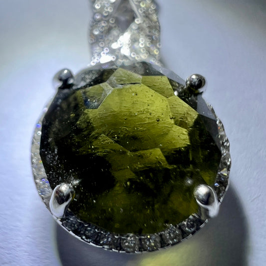 Faceted Moldavite pendant with Zircon 3.28ct