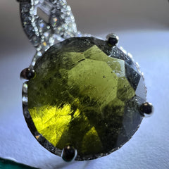 Faceted Moldavite pendant with Zircon 3.28ct