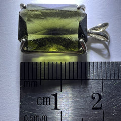 Faceted Moldavite pendant - Emerald cut 7.09 carat.