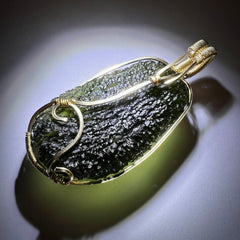 Statement piece Moldavite Pendant in 14k Gold.