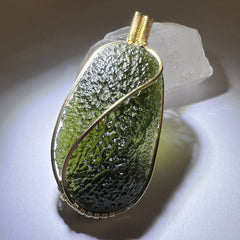 Statement piece Moldavite Pendant in 14k Gold.
