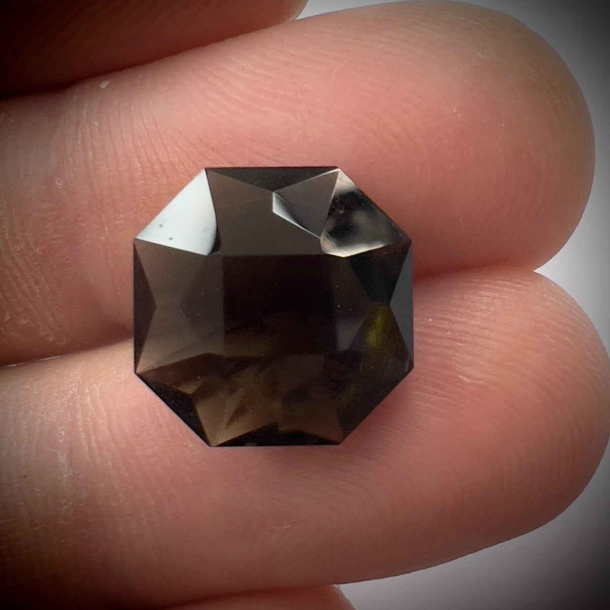 Exquisite faceted Moldavite "Emerald Cut"