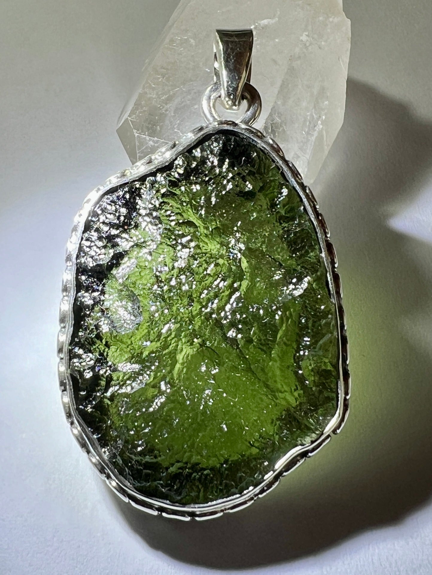 9.43g Bezel set Moldavite pendant.