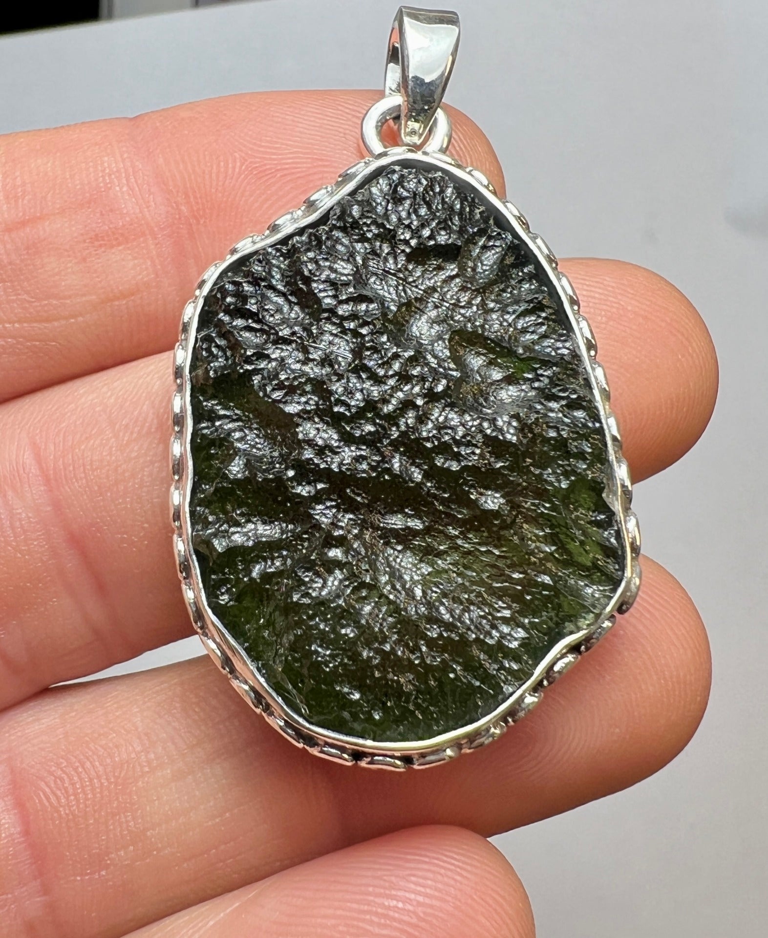 9.43g Bezel set Moldavite pendant.