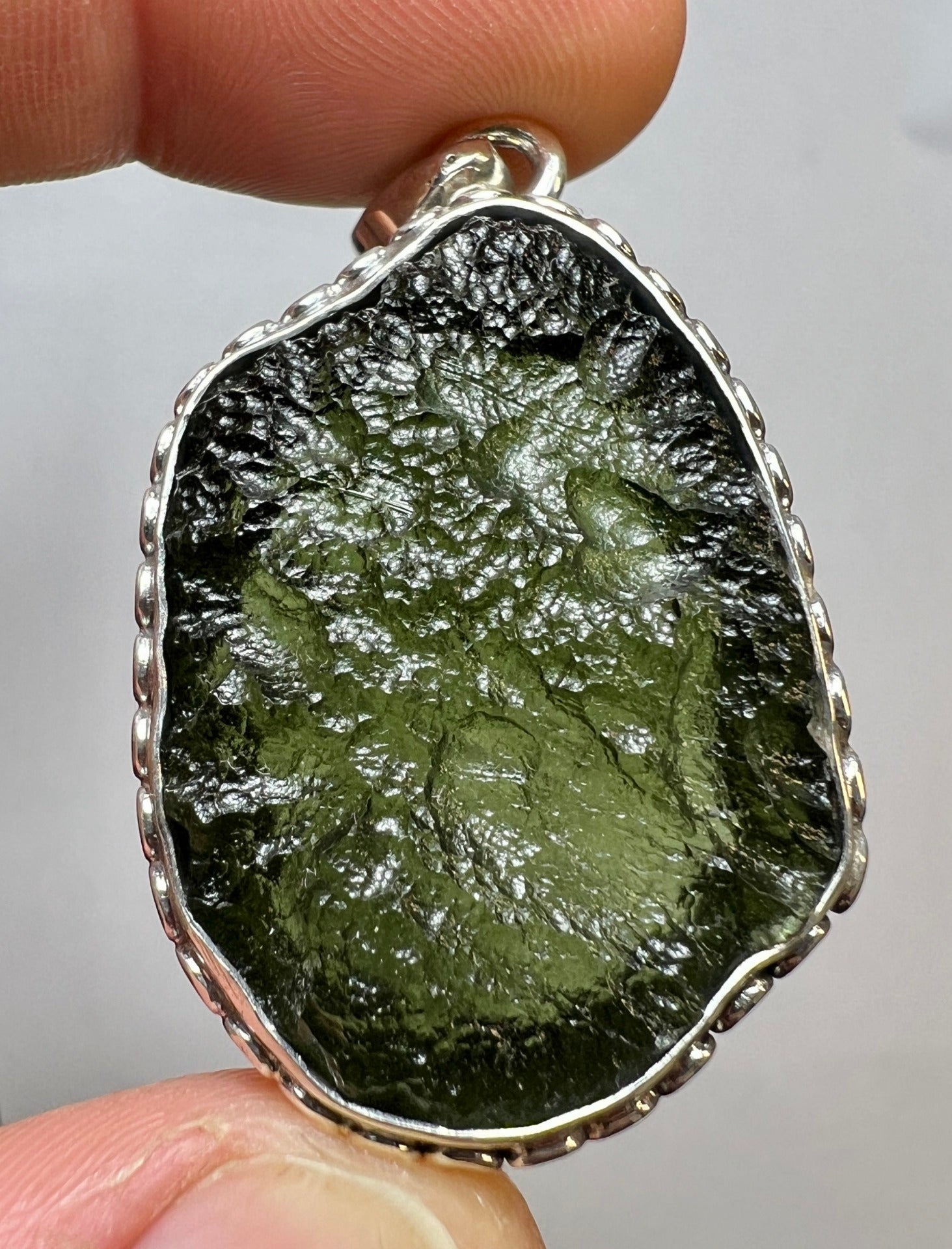 9.43g Bezel set Moldavite pendant.