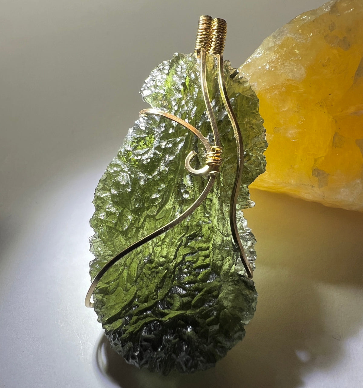 12g Moldavite pendant, 14ct Gold.