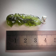 3.36g Moldavite pendant.