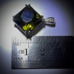 10.22ct Faceted Moldavite pendant in sterling silver.
