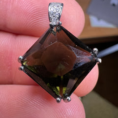 10.22ct Faceted Moldavite pendant in sterling silver.