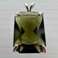 Faceted Moldavite pendant - Emerald cut 7.11 carat.