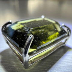 Faceted Moldavite pendant - Emerald cut 7.11 carat.