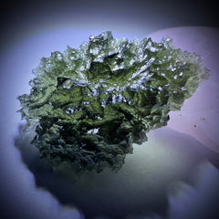 4.68g Moldavite with prominent Lechateliarite.