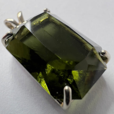 Faceted Moldavite pendant - Emerald cut 8.34 carat.