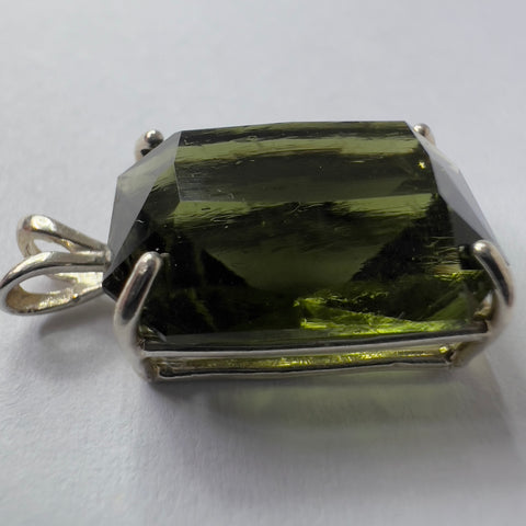 Faceted Moldavite pendant - Emerald cut 8.34 carat.