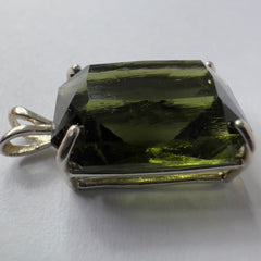 Faceted Moldavite pendant - Emerald cut 8.34 carat.
