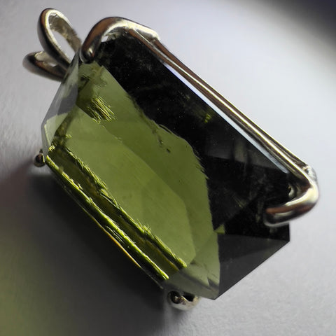Faceted Moldavite pendant - Emerald cut 8.34 carat.