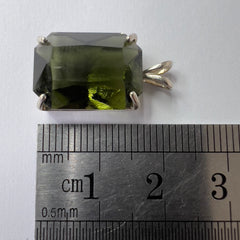 Faceted Moldavite pendant - Emerald cut 8.34 carat.