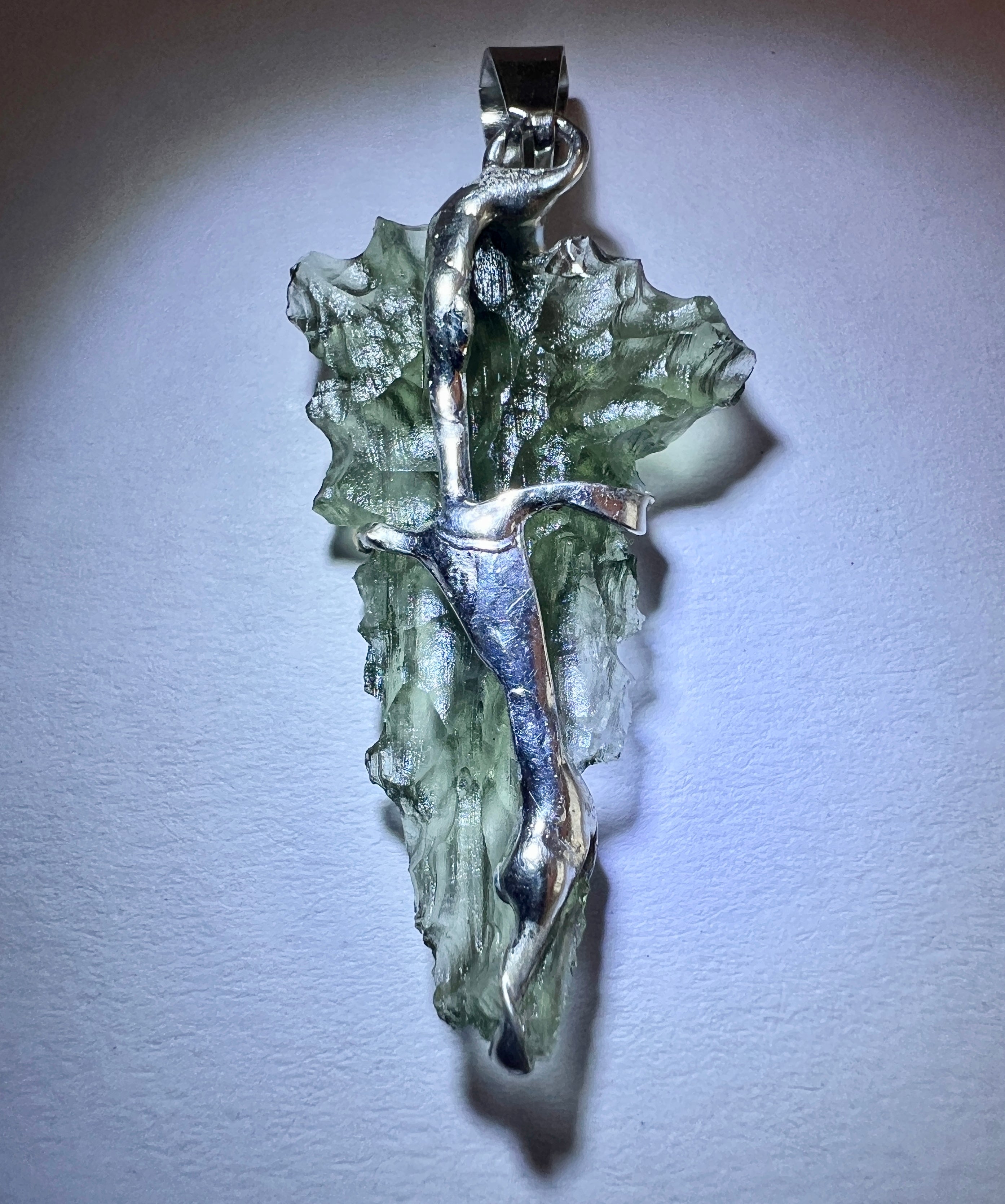 Moldavite Hedgehog pendant.