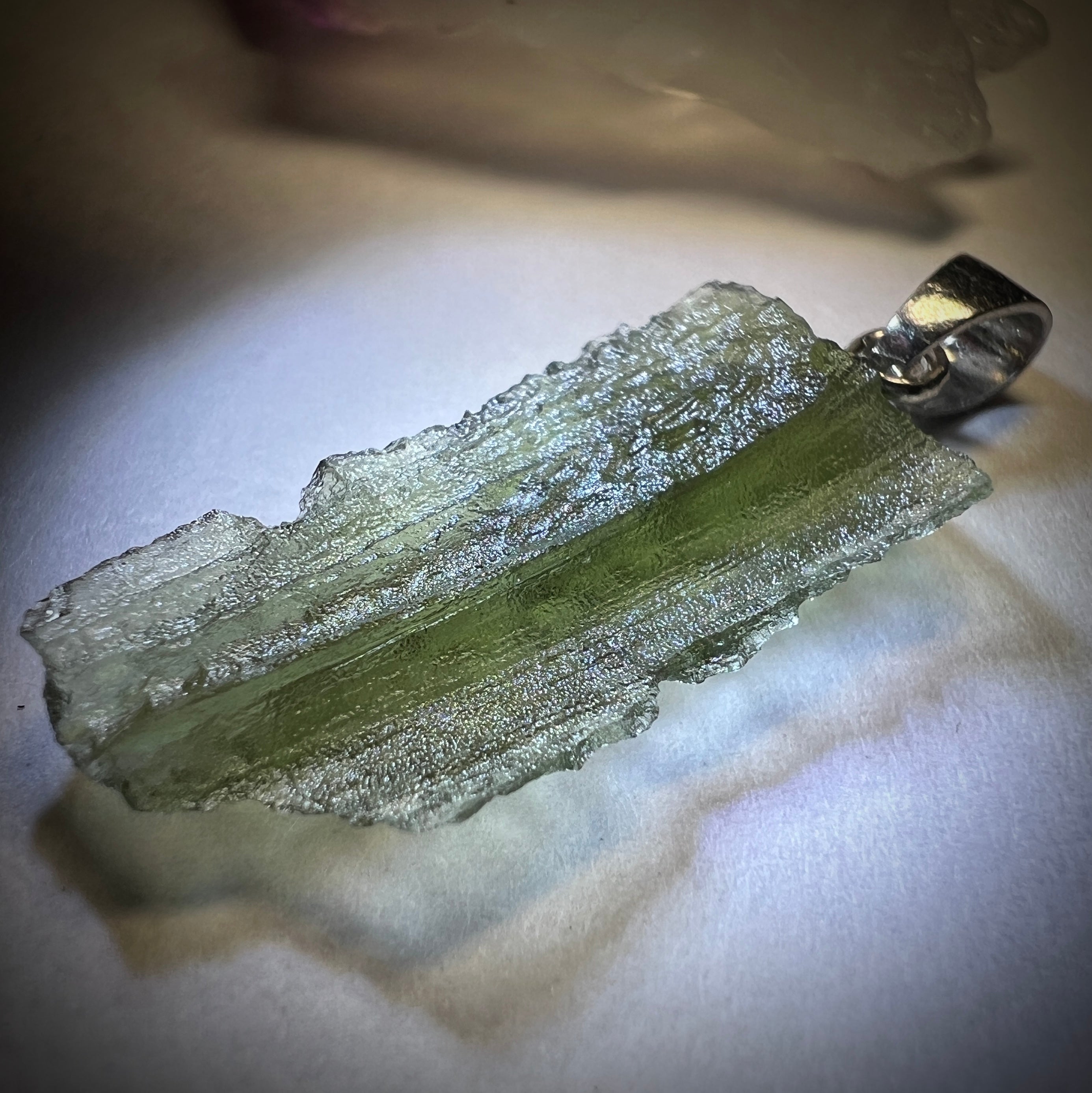 1.6g Moldavite/Silver pendant.