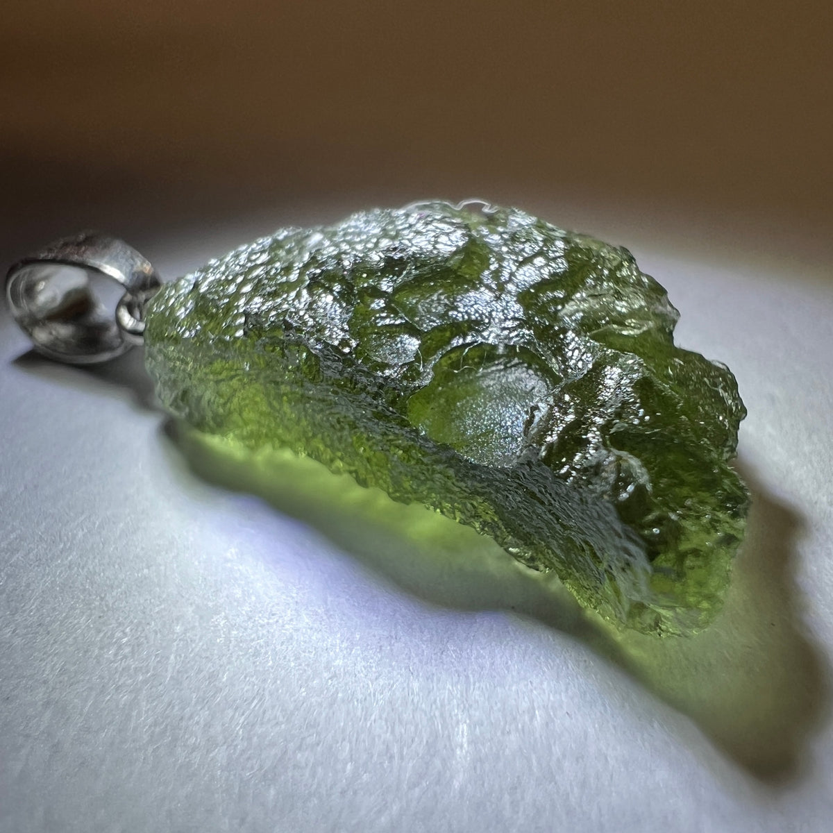 2.47g Moldavite/Silver pendant.