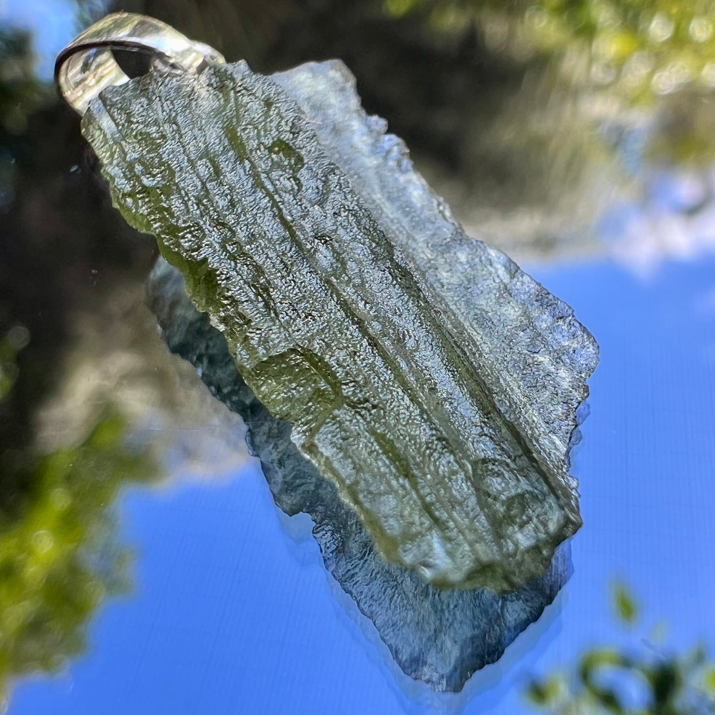 1.6g Moldavite/Silver pendant.