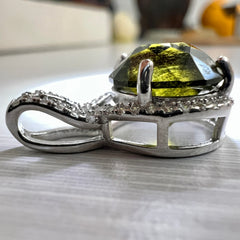 Faceted Moldavite pendant with Zircon 3.28ct
