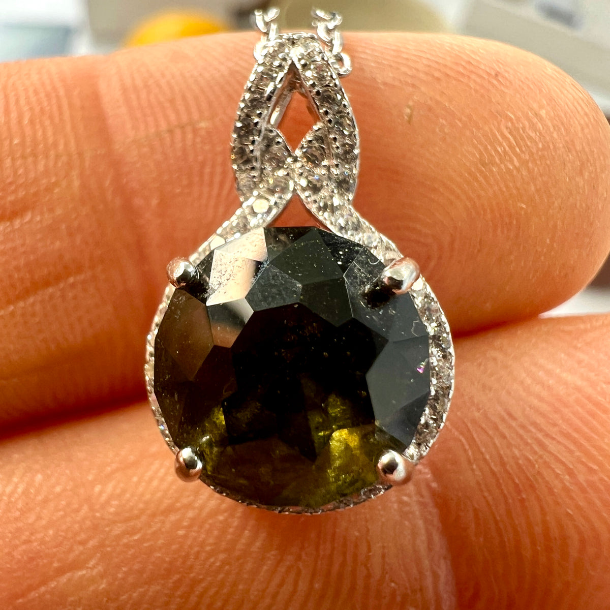 Faceted Moldavite pendant with Zircon 3.28ct