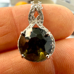 Faceted Moldavite pendant with Zircon 3.28ct