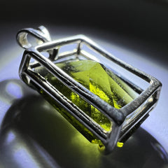 Faceted Moldavite pendant - Emerald cut 7.09 carat.