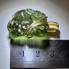 Moldavite pendant in 14k Gold. 4.96g