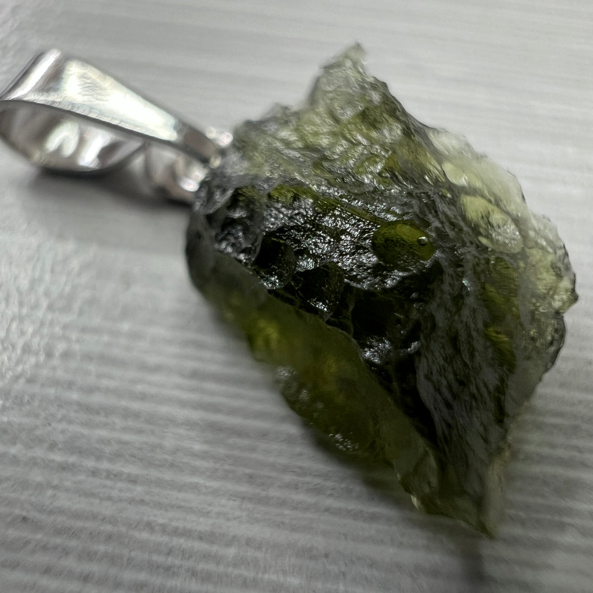 0.65g Moldavite Rhodium-Plated Silver Pendant