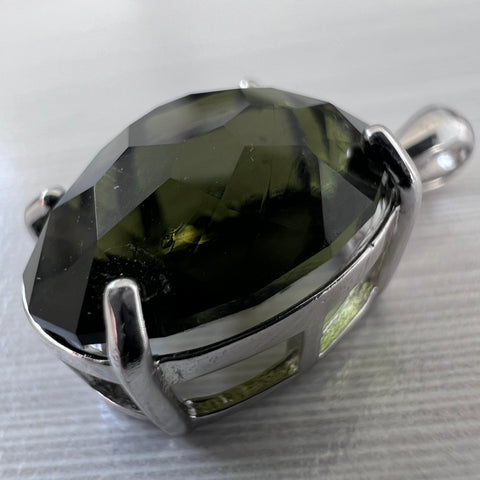 Exquisite Oval-Cut Faceted Moldavite Pendant — 6.99 ct