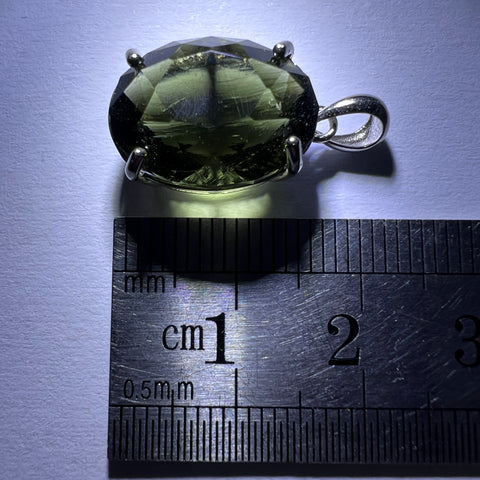 Exquisite Oval-Cut Faceted Moldavite Pendant — 6.99 ct