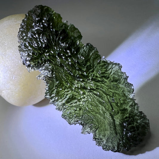11.49g Investment Grade Moldavite - Nesmen Les.
