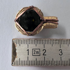 Faceted Moldavite in Gold Wrap - 6.69k Emerald Cut.