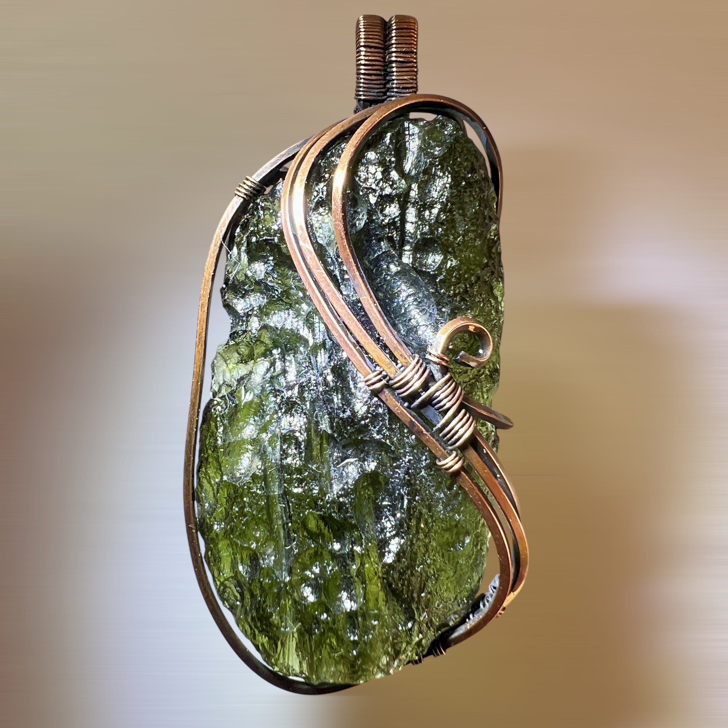 8.66g Moldavite pendant.