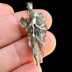 Moldavite Hedgehog pendant.