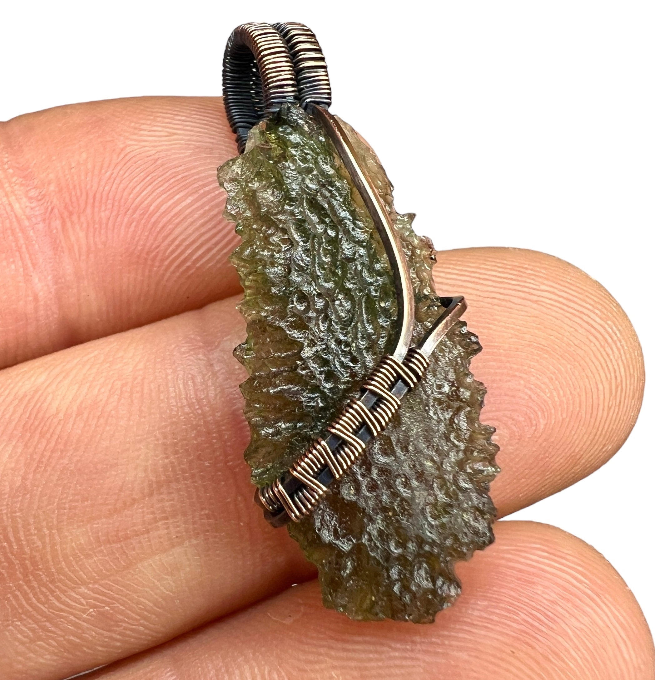 Moldavite pendant, elegant copper setting.