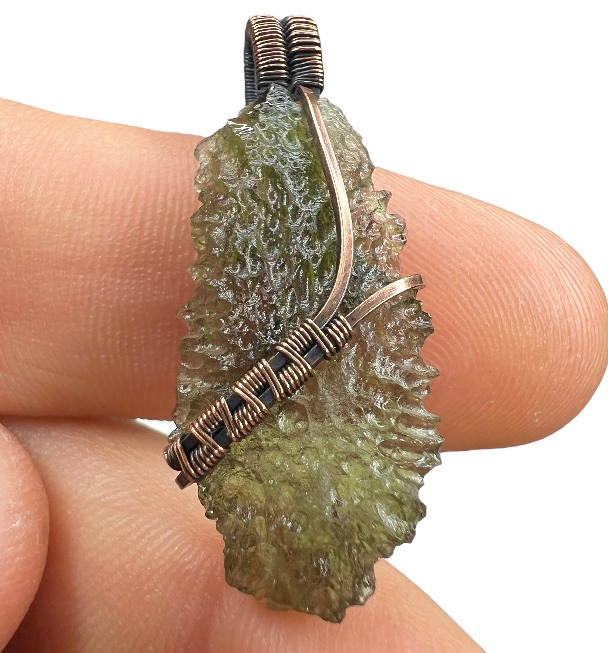 Moldavite pendant, elegant copper setting.
