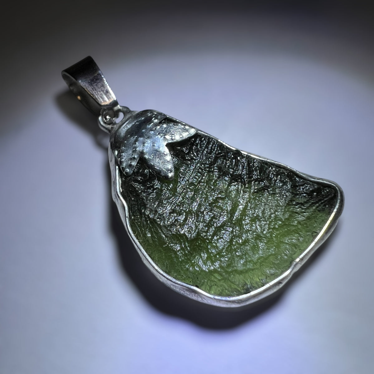 3.44g Moldavite pendant.