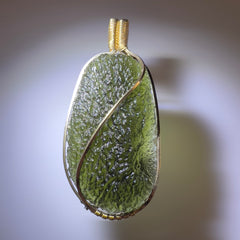 Statement piece Moldavite Pendant in 14k Gold.