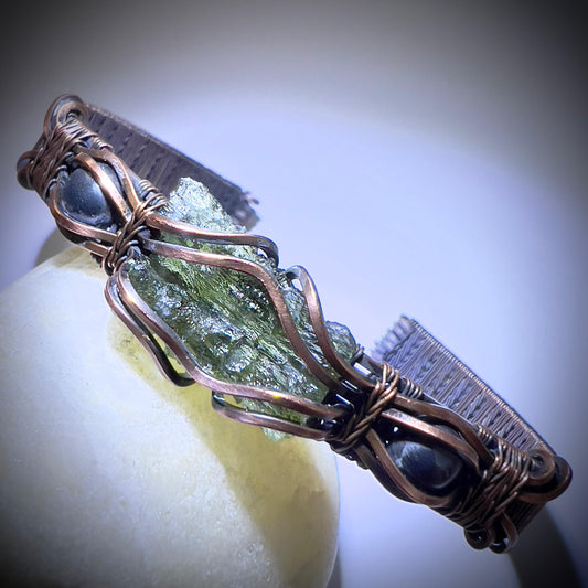 0.99g Moldavite & Copper Bracelet  0.99g Moldavite Accented with Hematite Stones
